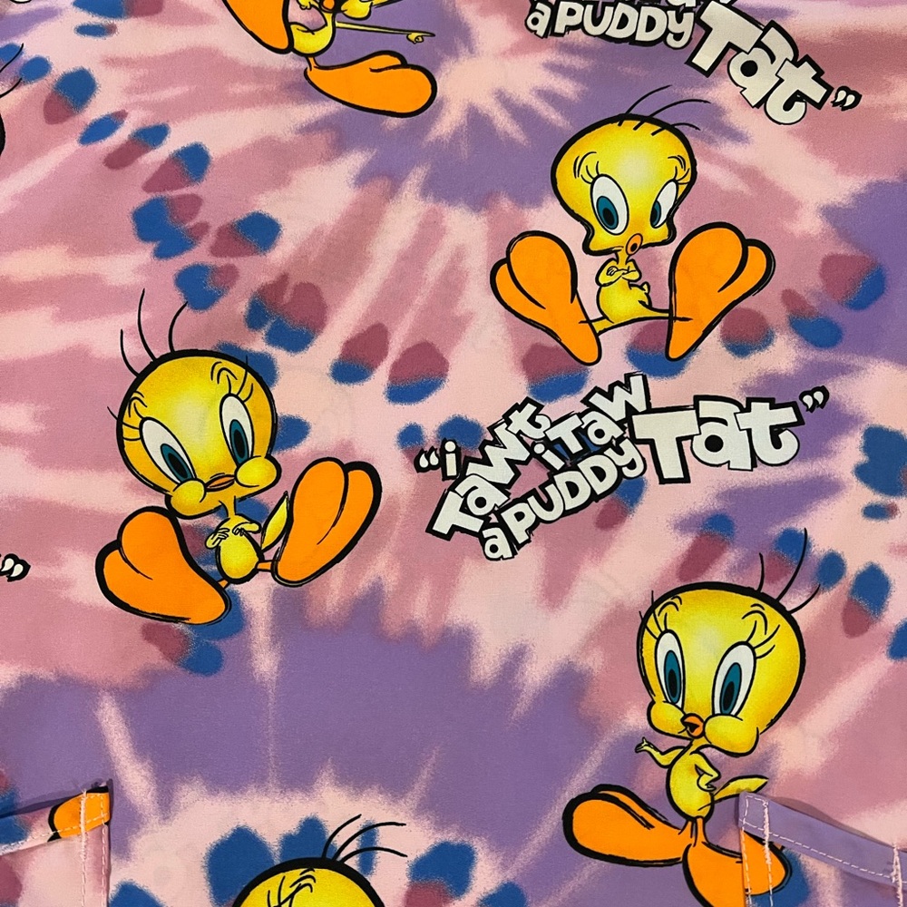 Brand new Tweety Bird Looney Tunes scrub top